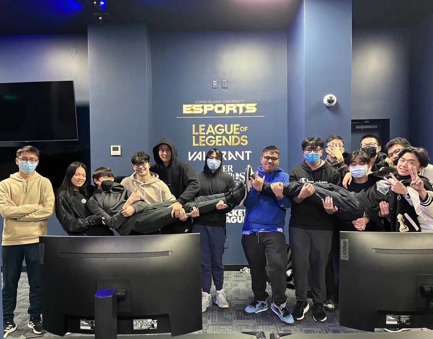 Squad photo by the esports banner